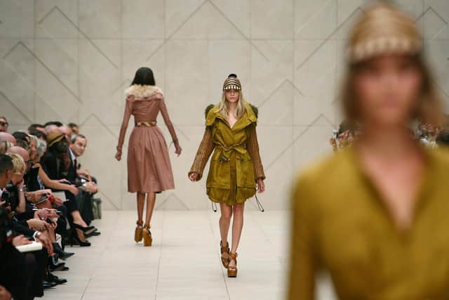 Models on the catwalk during the Burberry spring/summer 2012 show. (Picture credit: Gareth Fuller/PA)