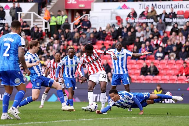 NO GAIN: Sheffield Wednesday's Gabriel Otegbayo attempts to block the shot from Stoke's Jesurun Rak-Sakyi Picture: Carl Recine/Getty Images.