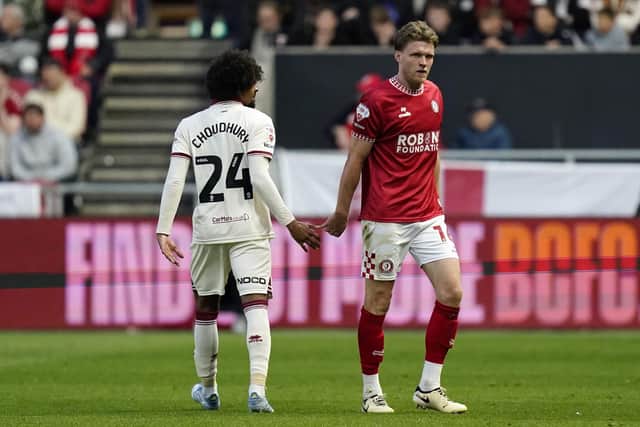RED CARD: Bristol City's Rob Dickie (right) walks off after being sent off (Image: Andrew Matthews/PA Wire)