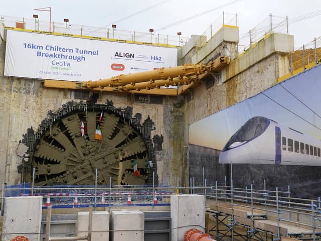 HS2 workers wave flags from the boring machine Cecelia following its break through after digging the longest tunnel in the HS2 project, completing its 10-mile journey under the Chiltern Hills. PIC: Andrew Matthews/PA Wire