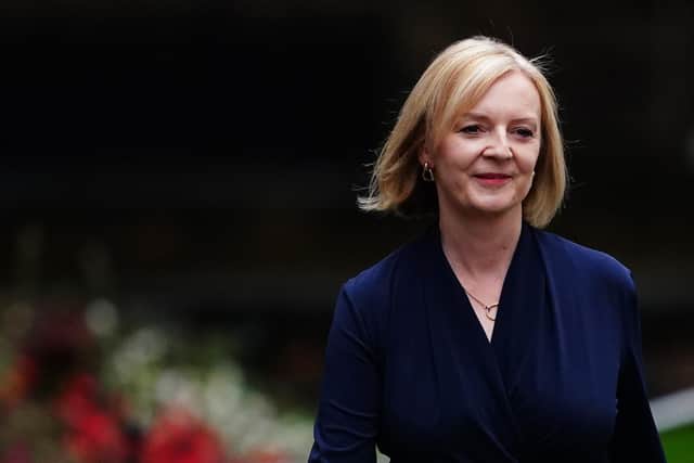 New Prime Minister Liz Truss arrives in Downing Street, London, after meeting Queen Elizabeth II and accepting her invitation to become Prime Minister and form a new government. Picture date: Tuesday September 6, 2022.