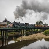 The LNER 1264 steam locomotive passes over the River Esk in Ruswarp on the North Yorkshire Moors Railway line between Whitby and Pickering. (Pic credit: Danny Lawson / PA Wire)