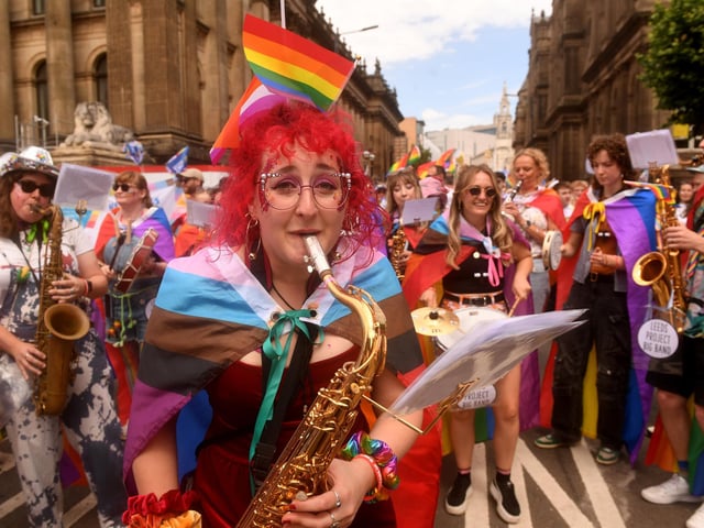 Members of the Leeds Project Big Band performed as they made their way through the city