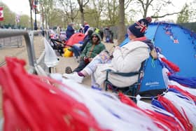 Royal fans camping out on The Mall, near Buckingham Palace in central London, ahead of the coronation of King Charles III and the Queen Consort. PIC: James Manning/PA Wire