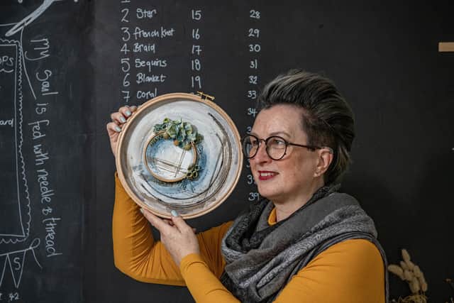 Brighouse textile artist and tutor Anne Brooke with her work,  photographed for The Yorkshire Post Magazine by Tony Johnson.
From her garden studio at her home she produces vintage stitched postcards, vintage fabric embroidery and collage gardens as well as teaching workshops.