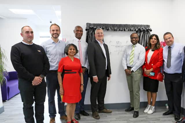 The leader of Leeds City Council, Coun James Lewis, and the chair of Unity Enterprise, Sharon Jandu OBE, have jointly unveiled a plaque to celebrate the opening of a fully refurbished Leeds Media Centre. (Photo supplied by Unity Enterprise)
