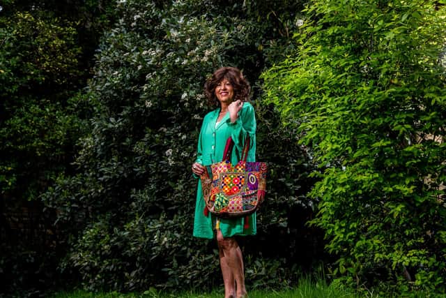 Liz Green wears: Green coat dress, £55; large Indian beach/shopper summer bag, £65, from Caché La Boutique in Elland and online at Cacheboutique.co.uk. Picture By Yorkshire Post photographer James Hardisty