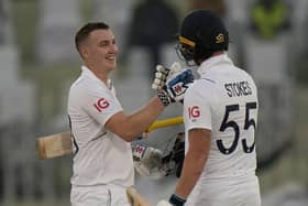 SO CLOSE: Yorkshire's Harry Brook, left, is congratulated by England captain Ben Stokes after scoring century on the first day of the first Test match against Pakistan in Rawalpindi Picture: AP Photo/Anjum Naveed