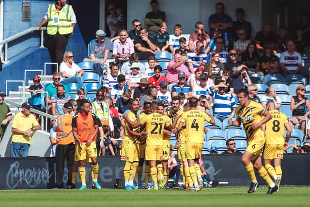 Rotherham United’s Chiedozie Ogbene celebrates after scoring their first goal with team-mates during the Sky Bet Championship match at Loftus Road, London. Picture: Rhianna Chadwick/PA Wire