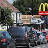 Cars queue at a Drive Thru McDonald's on May 21, 2020 in Sutton, England. (Photo by Andrew Redington/Getty Images)