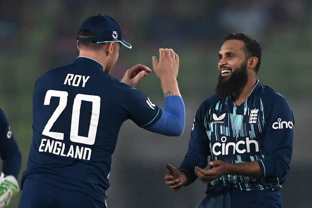 Right sort of headlines: Adil Rashid of England celebrates with Jason Roy after dismissing Mehidy Hasan Miraz of Bangladesh. (Picture: Gareth Copley/Getty Images)