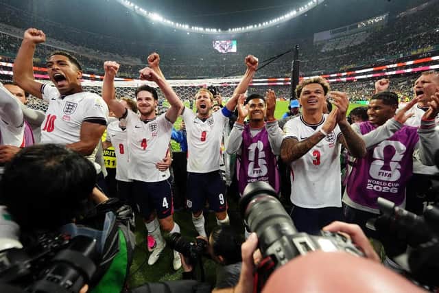 IN GOOD VOICE: England's players celebrate their stunning 3-2 win over co-hosts Mexico with their supporters at the Azteca Stadium. Picture: Nick Potts/PA.