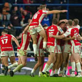 MAGIC MOMENT: Hull KR celebrates after Brad Schneider kicks the golden point to win the match. Picture by Bruce Rollinson