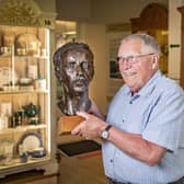 Former Hornsea Pottery worker Paul Bickerdike with a bust of designer Alan Luckham in the collection at Hornsea Museum, photographed for the Yorkshire Post Magazine by Tony Johnson.