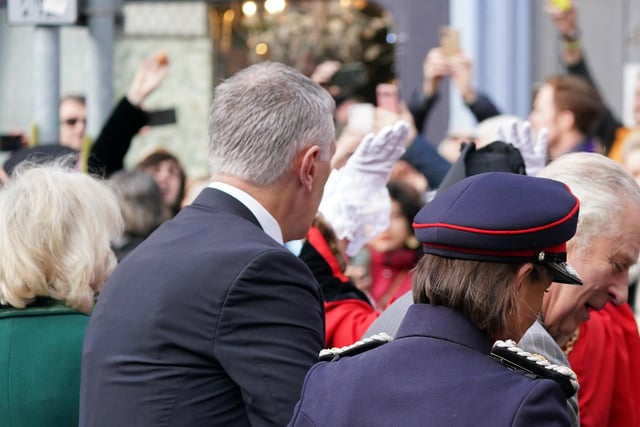 A protester (top left) throws eggs at King Charles III (right) and the Queen Consort (left) as they arrive for a ceremony at Micklegate Bar in York, where the Sovereign is traditionally welcomed to the city. Picture date: Wednesday November 9, 2022.