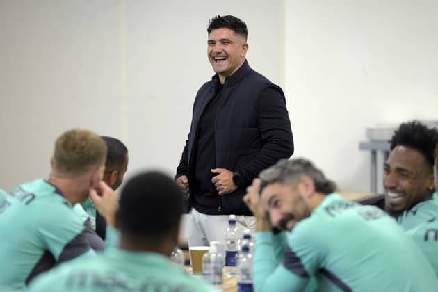STARTING WITH A SMILE: New Sheffield Wednesday manager Xisco Munoz meets his players