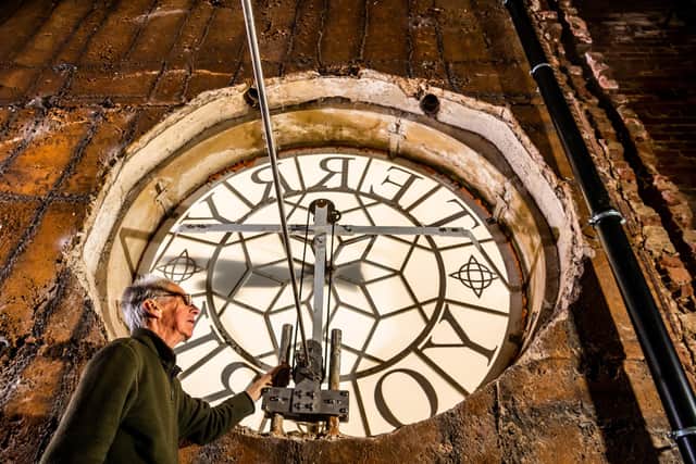 Turning the clock back: John Cossins one of the volunteers of the York Clock Group at 8ft at Terry Clock Tower in York which was converted by the PJ Livesey Group.
Picture By Yorkshire Post Photographer,  James Hardisty.