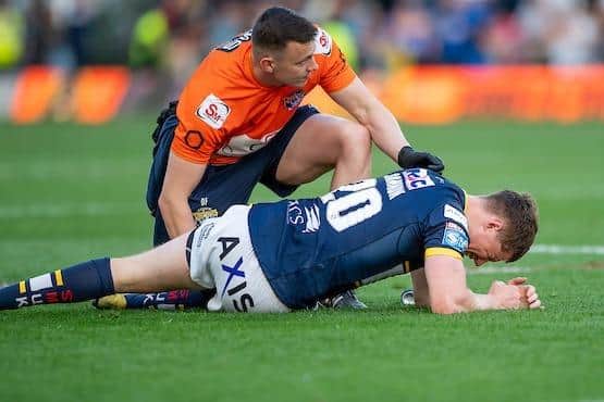 Morgan Gannon feels the pain of the ankle injury suffered against St Helens. (Photo: Allan McKenzie/SWpix.com)
