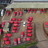 Library image of Royal Mail vehicles parked at the Ashford Delivery Office in Ashford, Kent. Moonpig has cut its sales forecast for the year after being hit by Royal Mail postal strikes and pressure on consumers.