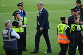 FAILURE: Sam Allardyce leaves the pitch after Leeds United are relegated from the Premier League