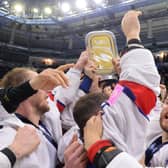GOLDEN GLORY: GB's players - including Sheffield Steelers' captain Rob Dowd (right) - celebrate their gold medal success in the World Championships Division 1A tournament in Nottingham earlier this tear - securing promotion back to the top tier of the international game at the first attempt. Picture courtesy of Dean Woolley/Ice Hockey UK