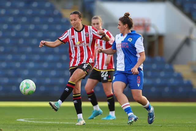 Back for more: Leanne Cowan of Sheffield United, left, playing against Blackburn Rovers in the Championship last season. It was Rovers' decision to drop down the divisions that spared United (Picture: Simon Bellis / Sportimage)