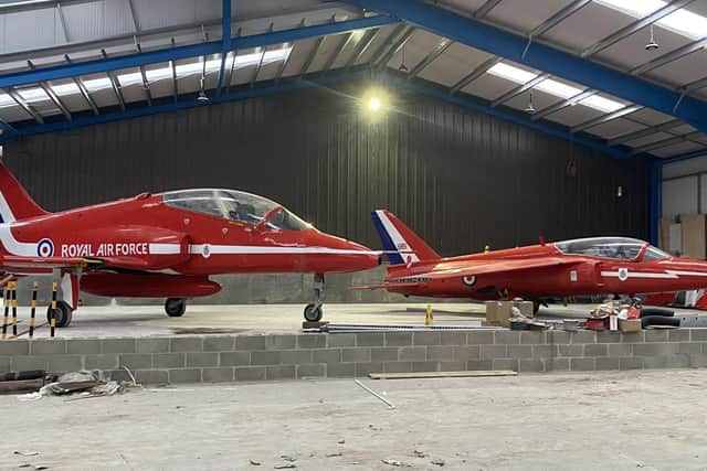The Hawk and Gnat in Red Arrows colours at Metcalfe's premises in Leyburn