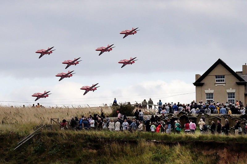People watching on the east cliff enjoy the Red Arrows display.
picture: Richard Ponter