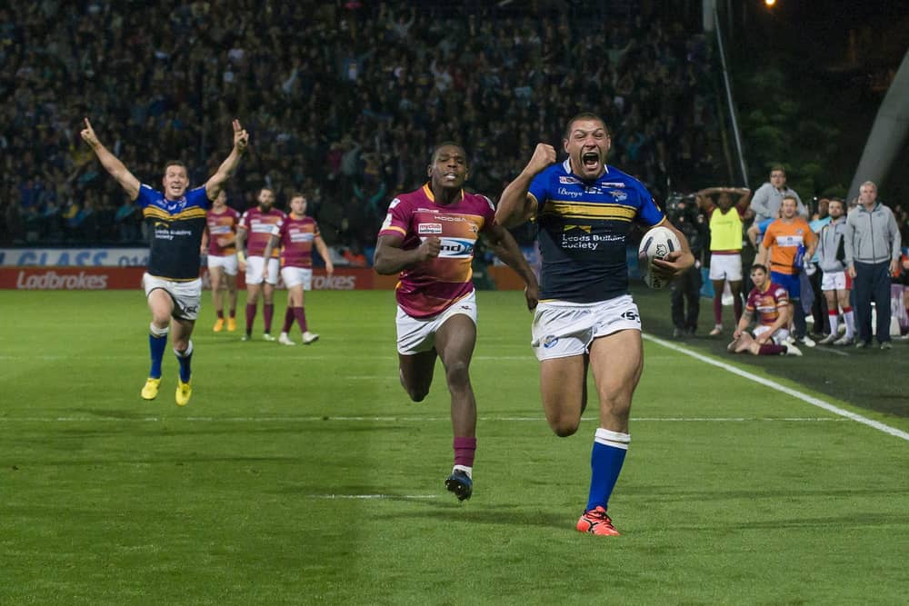 Ryan Hall races clear to score the League Leaders' Shield-clinching try in 2015 as Danny McGuire celebrates in the background. (Photo: Allan McKenzie/SWpix.com)