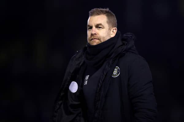 HARROGATE, ENGLAND - DECEMBER 07: Simon Weaver, Manager of Harrogate Town looks on prior to the Sky Bet League Two match between Harrogate Town and Forest Green Rovers at The EnviroVent Stadium on December 07, 2021 in Harrogate, England. (Photo by George Wood/Getty Images)
