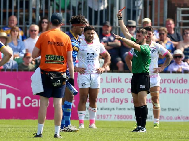 Hugo Salabio is shown a red card against Leeds. (Photo: Nigel French/PA)