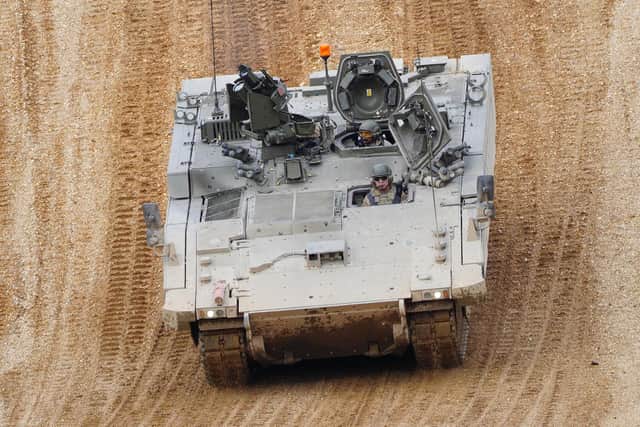 An Ajax Ares tank, an armoured personnel carrier, on the training range at Bovington Camp, a British Army military base in Dorset. PIC: PA