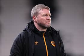 Grant McCann, manager of Hull City, reacts during the Papa John's Trophy match between against Fleetwood Town at the KCOM Stadium.