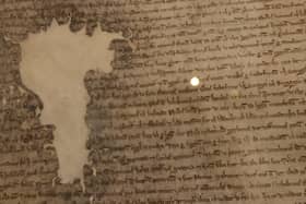 A detail of a piece of Magna Carta, 1225, at the British Museum on May 11, 2021. PIC: Dan Kitwood/Getty Images