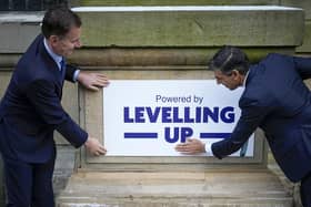 Chancellor Jeremy Hunt (left) and Prime Minister Rishi Sunak with a Levelling Up sign. PIC: Christopher Furlong/PA Wire