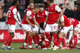 Rotherham United's Shane Ferguson (ground) celebrates scoring their side's third goal of the game during the Sky Bet Championship match at the AESSEAL New York Stadium, Rotherham. Picture: Richard Sellers/PA