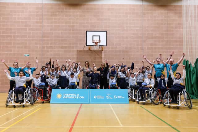Pupils at Bradford Girls Grammar School with Paralympian Siobhan Fitzpatrick after an Inspire a Generation wheelchair basketball session.