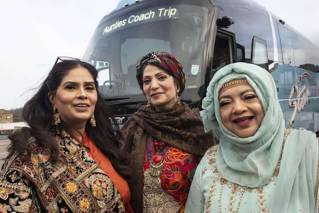 Youngsters and their older 'Aunties' on a coach trip to Blackpool from the Womenzone community centre in Bradford, part of Clockwork Film's Bradford Aunties documentary for the BBC. Photo by Tim Smith.