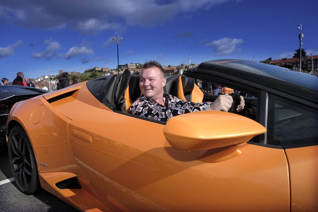An owner taking part in the supercar parade