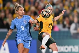 England's forward #09 Rachel Daly fights for the ball with Australia's defender #21 Ellie Carpenter during the Australia and New Zealand 2023 Women's World Cup semi-final (Picture: IZHAR KHAN/AFP via Getty Images)