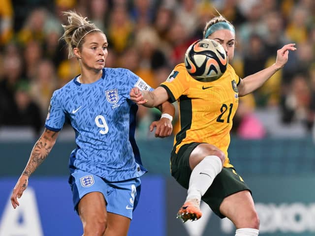England's forward #09 Rachel Daly fights for the ball with Australia's defender #21 Ellie Carpenter during the Australia and New Zealand 2023 Women's World Cup semi-final (Picture: IZHAR KHAN/AFP via Getty Images)