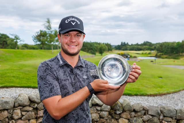 Sheffield's Sam Bairstow proudly shows off the trophy following his one stroke victory during Day Four of the Farmfoods Scottish Challenge supported by the R&A at Newmachar Golf Club on August 13, 2023 in Aberdeen, Scotland. (Picture: Kenny Smith/Getty Images)