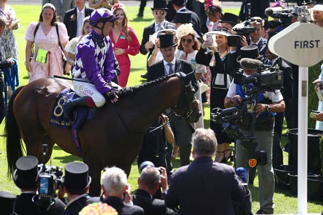 Jockey Oisin Murphy and Shaquille return to the winner's enclosure after victory in the Commonwealth Cup on the fourth day of the Royal Ascot horse racing meeting on June 23, 2023. (Picture: HENRY NICHOLLS/AFP via Getty Images)