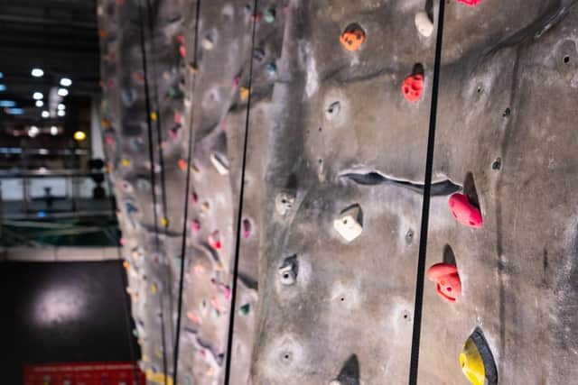 A climbing wall awaits first-time climbers and seasoned professionals