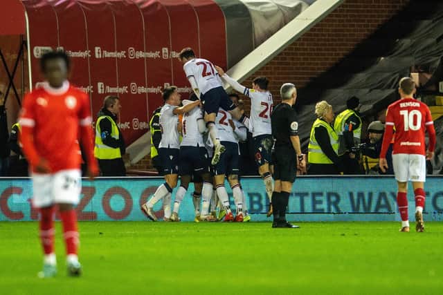 Bolton celebrate their third goal. (Picture: Bruce Rollinson)