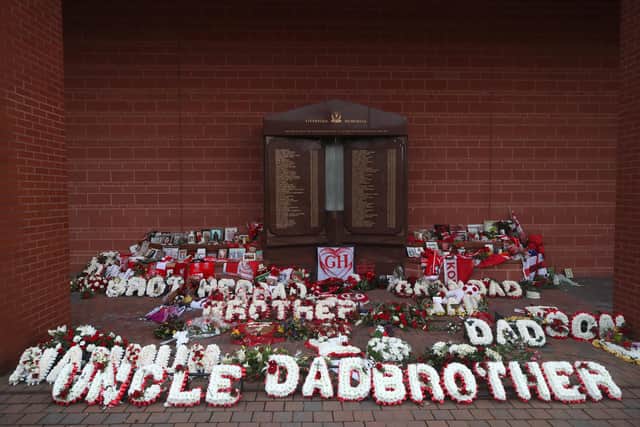 A general view of floral tributes at the Hillsborough Memorial at Anfield Stadium, Liverpool. Police chiefs have promised a "cultural change" as they apologised to families of Hillsborough victims almost 34 years on from the disaster.