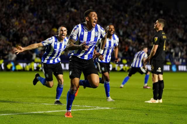 MAGIC MOMENT: Sheffield Wednesday's Liam Palmer celebrates scoring the hosts' late, late equaliser against Peterborough United at Hillsborough, the Owls eventually winning 5-3 on penalties to reach Wembley. Picture: Nick Potts/PA