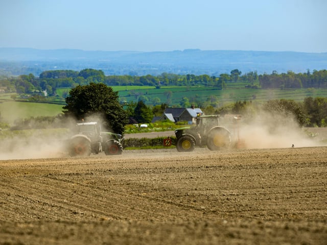 Farmers drive their tractors through a dry and dusty field as drought conditions continue to worsen across parts of the UK this spring. This image, taken near Helmsley, North Yorkshire, during an extended spell of below-average rainfall, shows the impact of the dry weather on farmland.  Picture: James Hardisty.