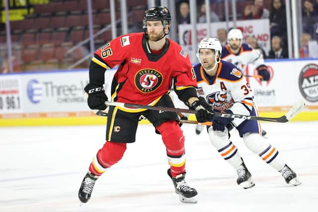 FRONT AND CENTRE: Mark Simpson - pictured above for Stockton Heat - will get his first taste of UK Elite League hockey with Sheffield Steelers next season. Picture courtesy of Calgary Wranglersa/Flames