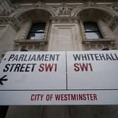 A street sign giving directions to Parliament Street and Whitehall in London. PIC: Yui Mok/PA Wire